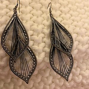 Tear drop shaped threaded elegant earrings.